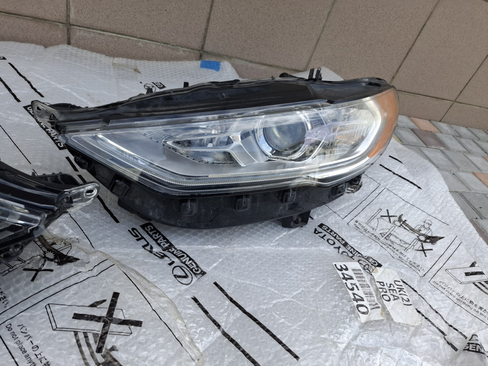 Лицензия б/у Фара левая Ford Fusion Америка с LED ДХО 2017 - 2024 Б/у в сборе с блоками / лампами Фара Фьюжн USA